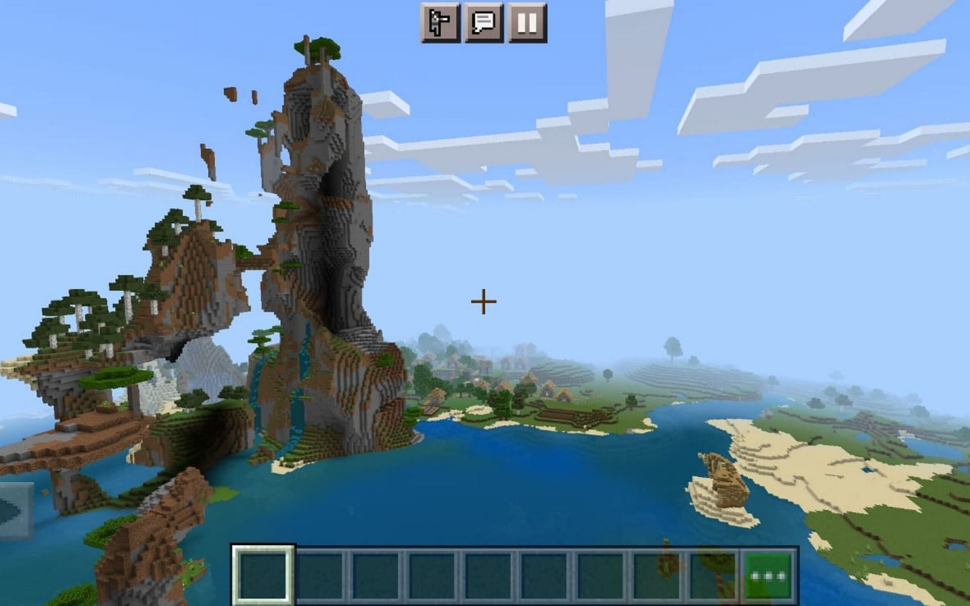 تفرخ جميل بجبال ممزقة وقرية شاسعة وحطام سفينة (الصورة من Minecraft)