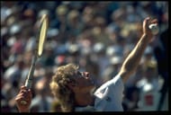 Vitas Gerulaitis serving at Wimbledon