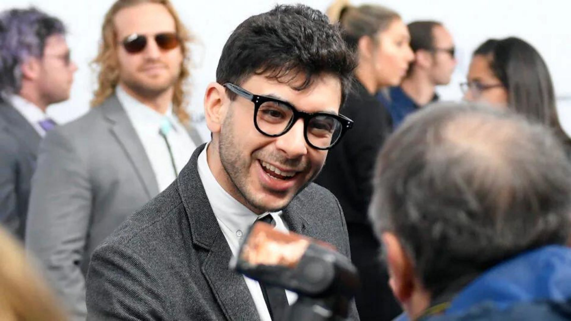 Tony Khan at a red carpet event in 2019