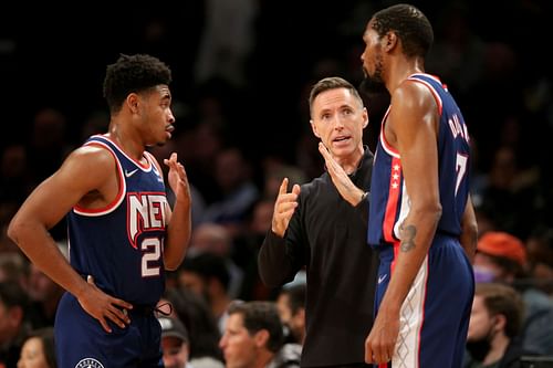 Kevin Durant and Cam Thomas receiving input