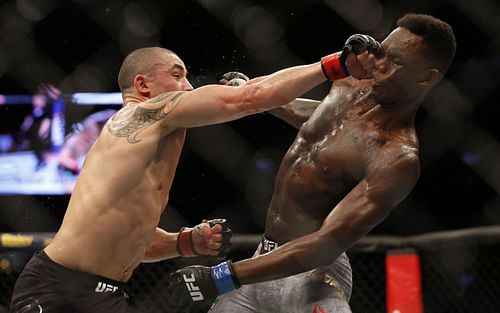 Robert Whittaker & Israel Adesanya [Image via Getty: UFC 243 Whittaker v Adesanya]