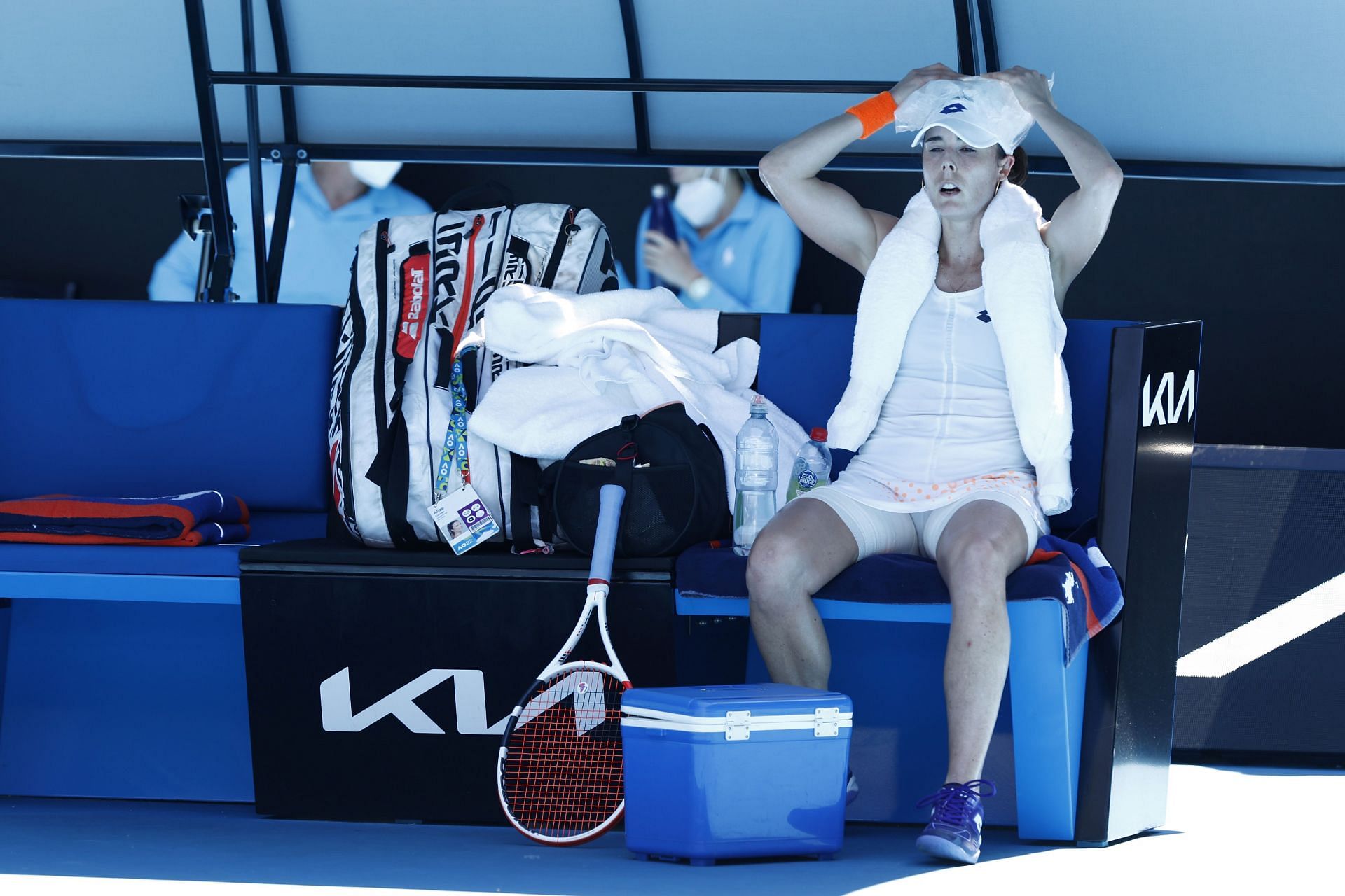 Cornet tries to cool herself during her match at the 2022 Australian Open.
