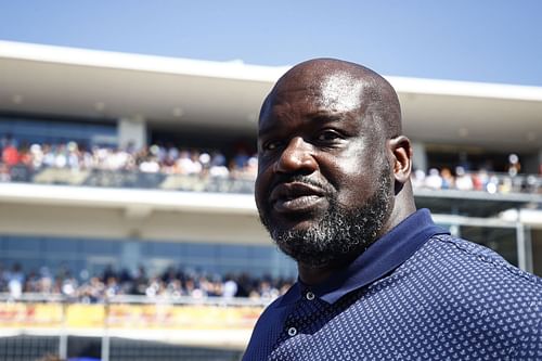 Shaquille O'Neal walks on the grid before the F1 Grand Prix.