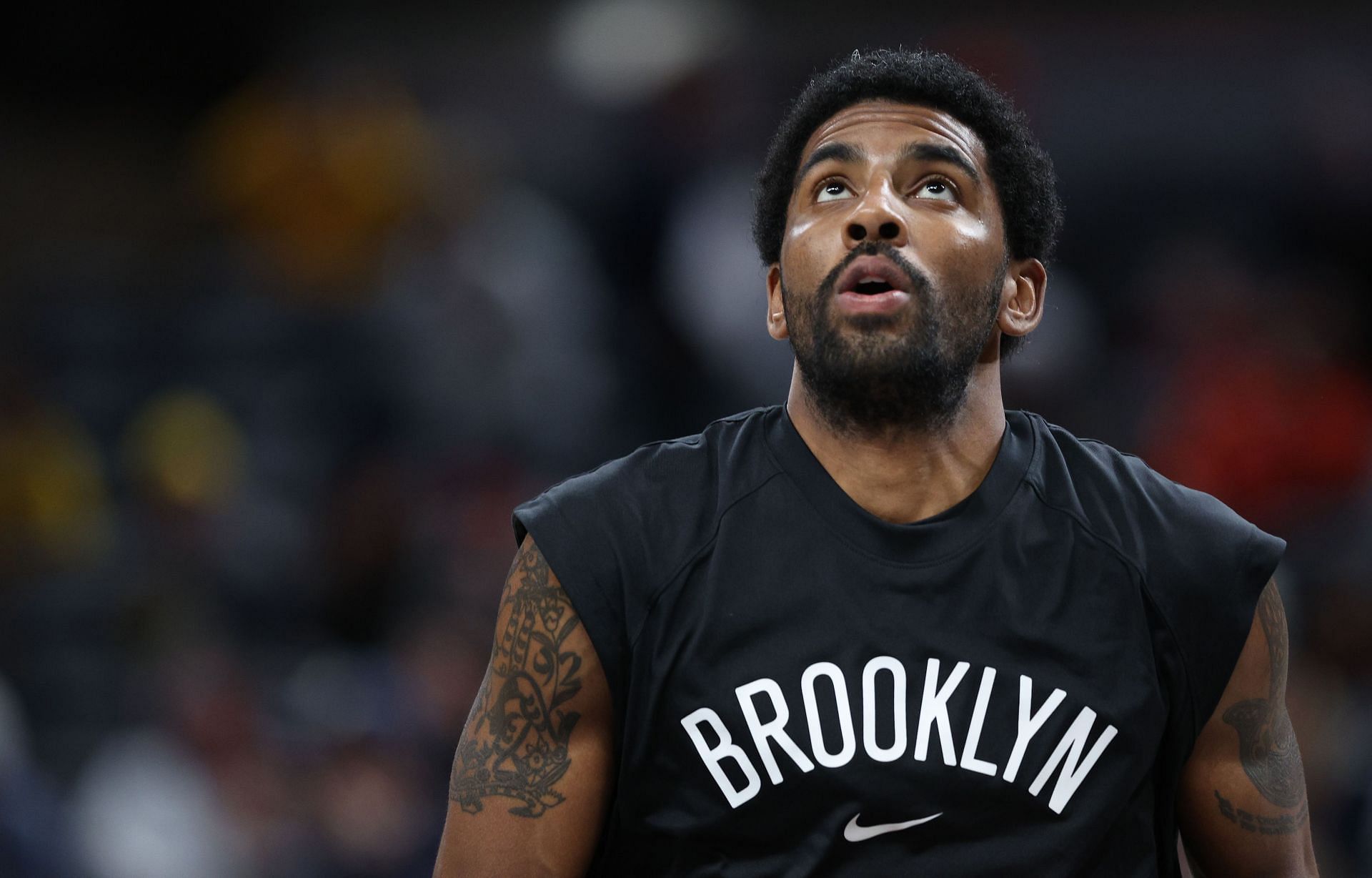 Brooklyn Nets star Kyrie Irving warms up before a game.