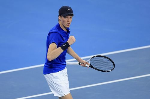 Jannik Sinner pumps his fist during Italy's group tie against France