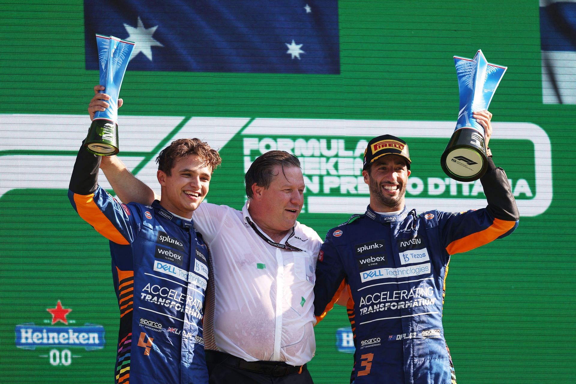 McLaren CEO Zak Brown (center) on the podium with Daniel Ricciardo (right) and Lando Norris (left) for the 2021 Italian Grand Prix