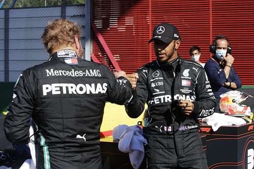 Lewis Hamilton (right) celebrates with Valtteri Bottas (left) during qualifying for the F1 Grand Prix of Tuscany at Mugello Circuit (Photo by Luca Bruno - Pool/Getty Images)