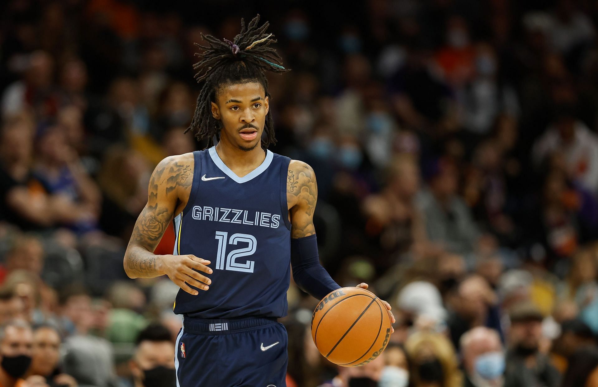 Ja Morant of the Memphis Grizzlies handles the ball Dec. 27, 2021, in Phoenix, Arizona.