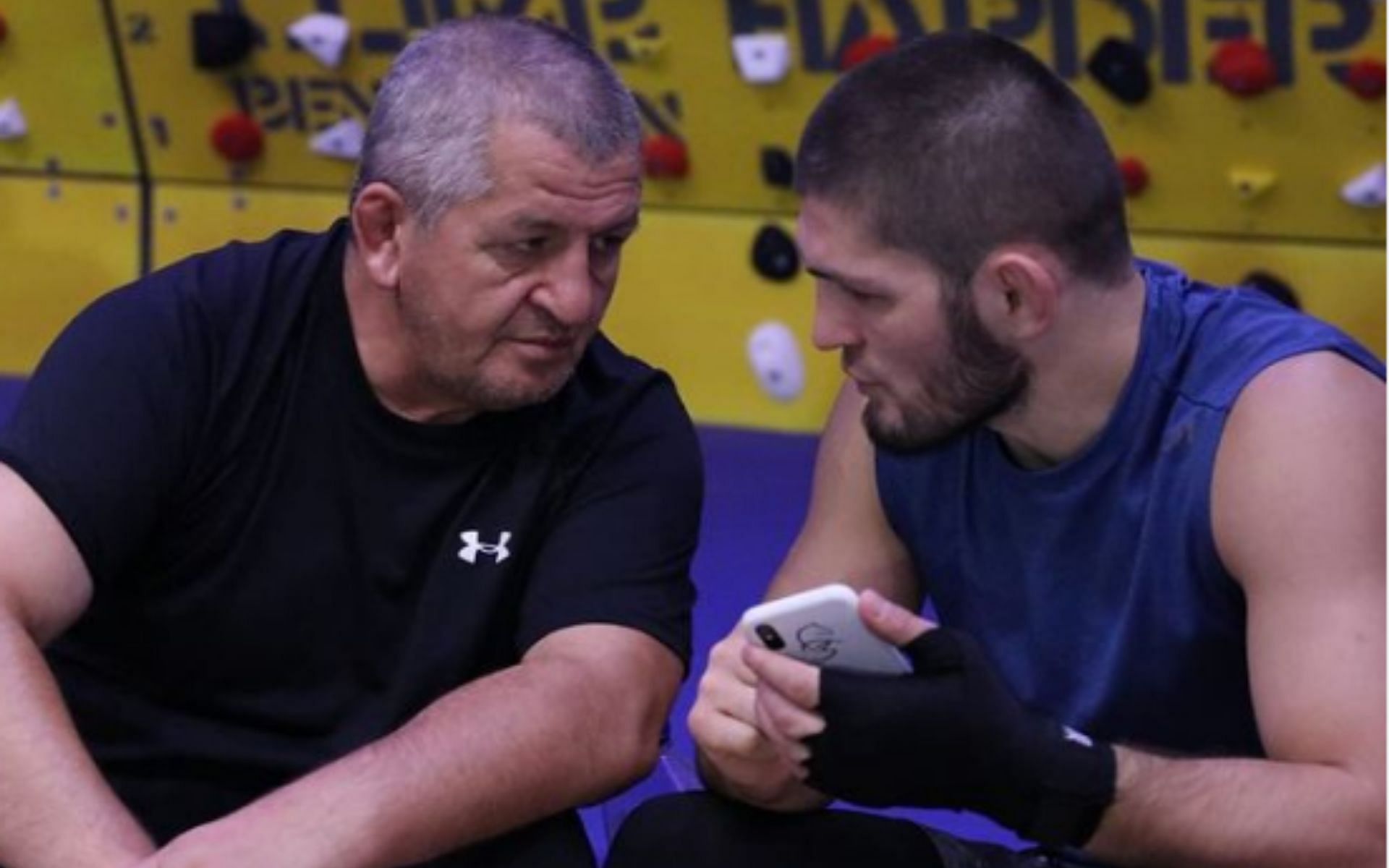 Former UFC lightweight champion Khabib Nurmagomedov (right) with his late father and coach Abdulmanap Nurmagomedov (left) during a training session [Image Credit: via @khabib_nurmagomedov on Instagram]