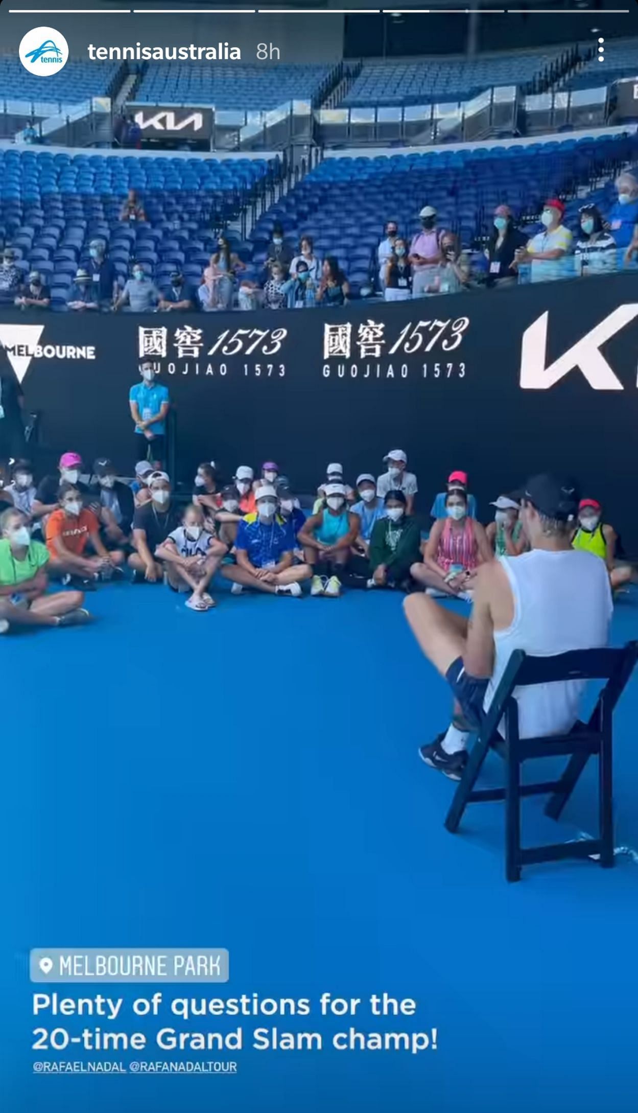 Nadal can be seen taking questions from the kids at the Rod Laver Arena in Melbourne