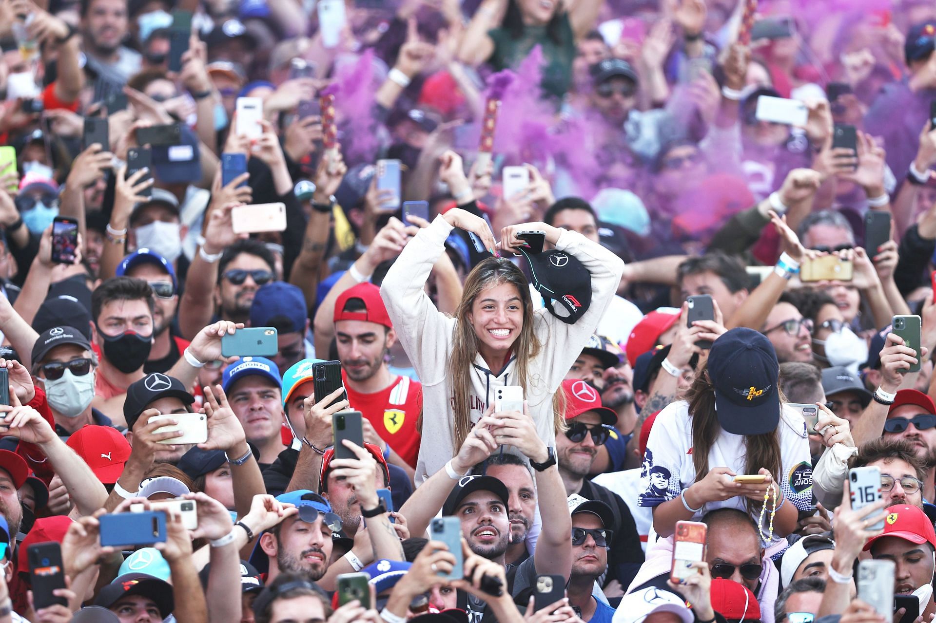 Fans enjoy the podium celebrations during the 2021 Grand Prix in Brazil (Photo by Lars Baron/Getty Images)