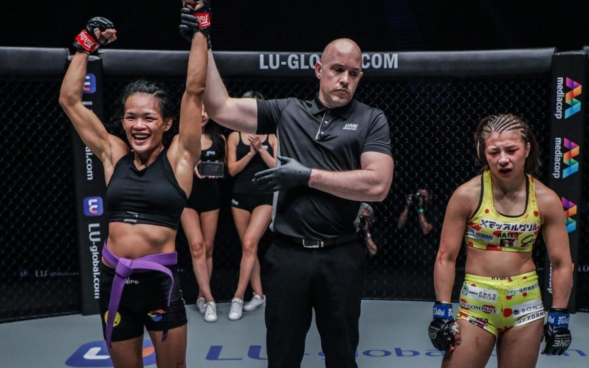 Tiffany Teo (Left) got her hand raised against Ayaka Miura (Right) at ONE: Heavy Hitters. | [Photo: ONE Championship]