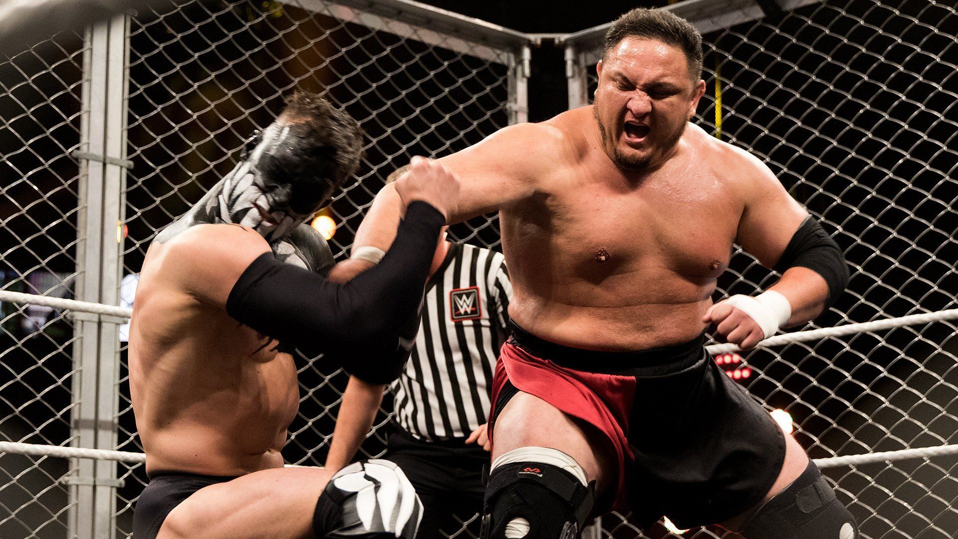 Samoa Joe and Finn Balor battling at NXT TakeOver
