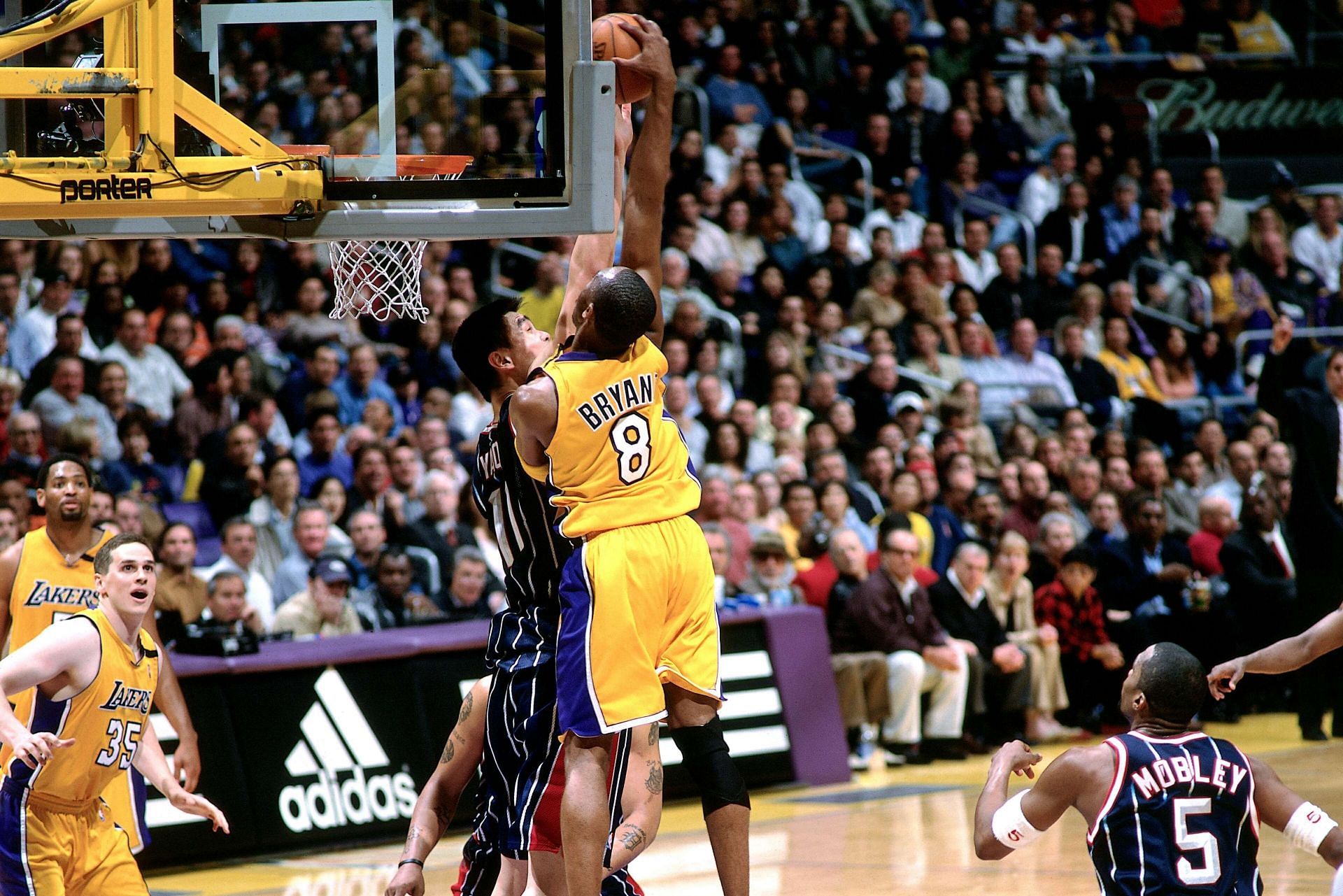 Kobe dunking on Yao Ming in 2003.