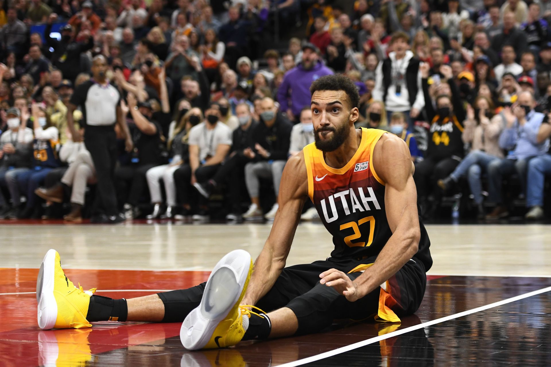 Rudy Gobert reacts to play at a Utah Jazz game