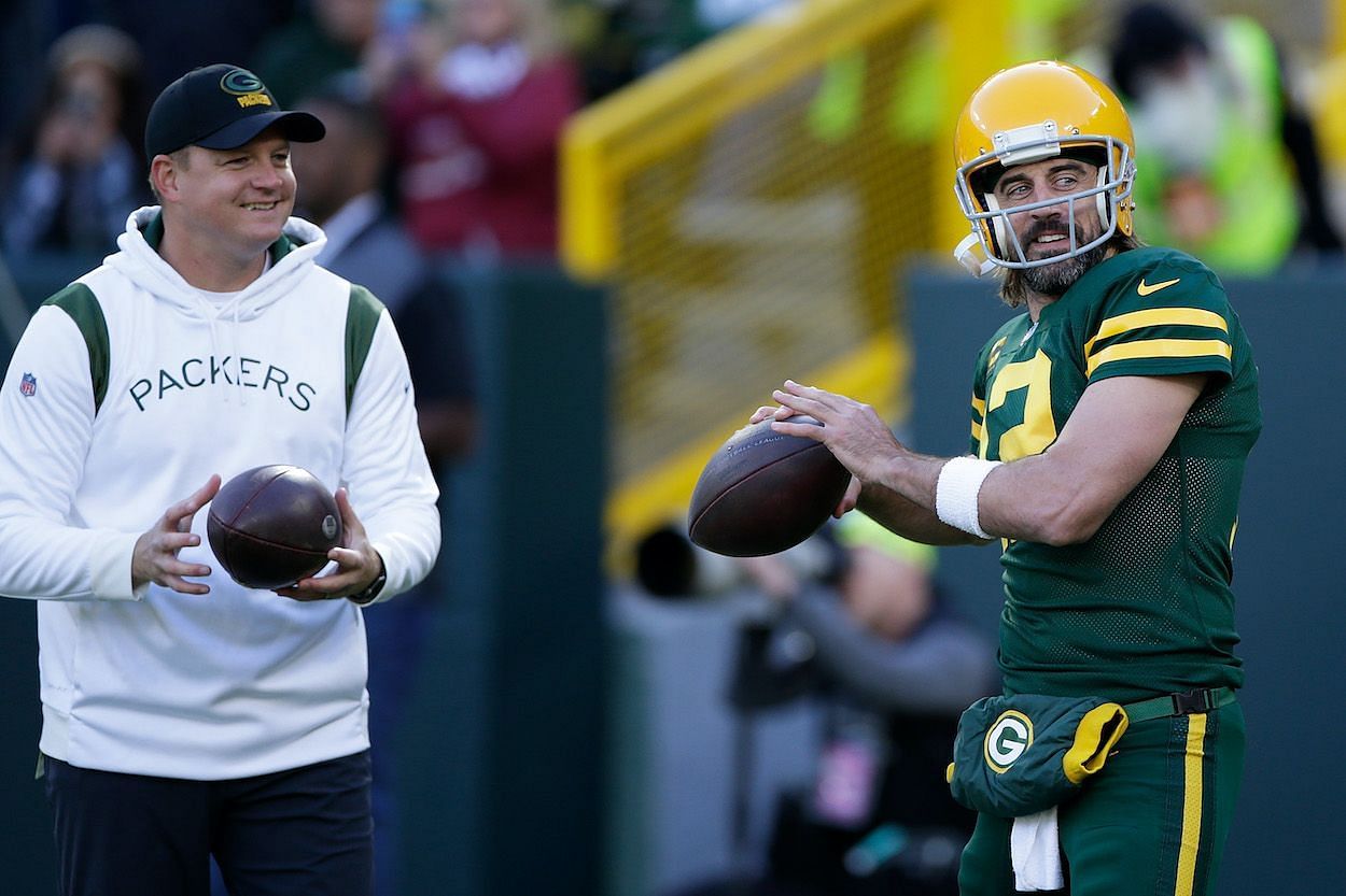 Offensive coordinator Nathaniel Hackett and quarterback Aaron Rodgers
