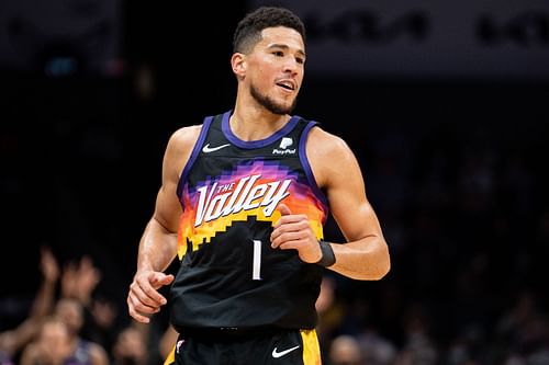 Devin Booker of the Phoenix Suns reacts after making a shot against the Charlotte Hornets on Jan. 2 in Charlotte, North Carolina.