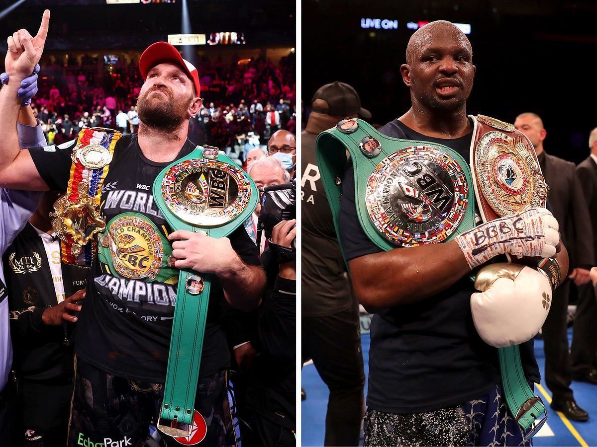 Tyson Fury and Dillian Whyte holding their belts