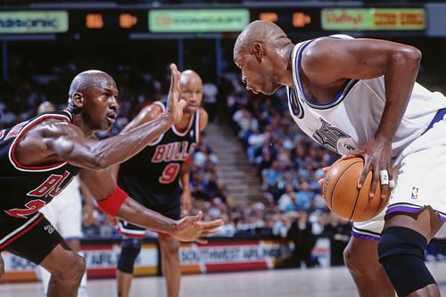 Michael Jordan and Mitch Richmond in NBA action.