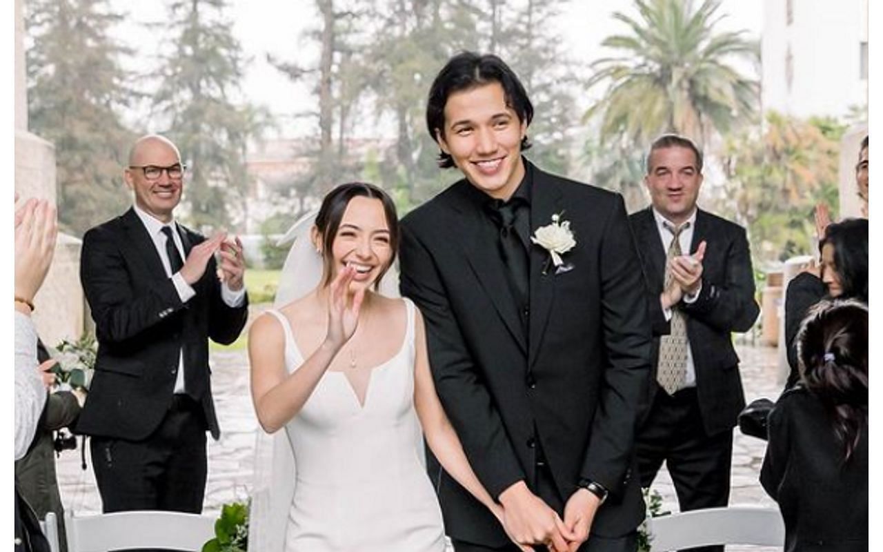 Veronica Merrell and Aaron Burriss on their wedding day (Image via aaronburriss/Instagram)