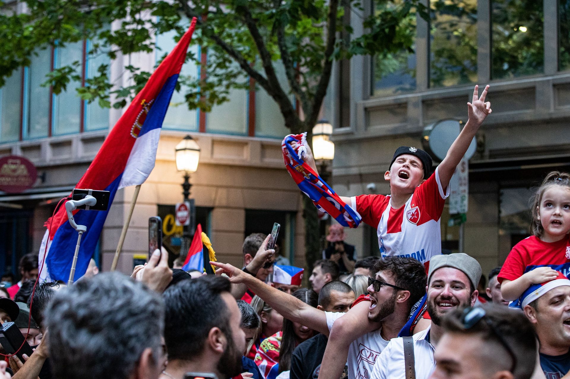 Serbian fans celebratw Novak Djokovic&#039;s win in the court case