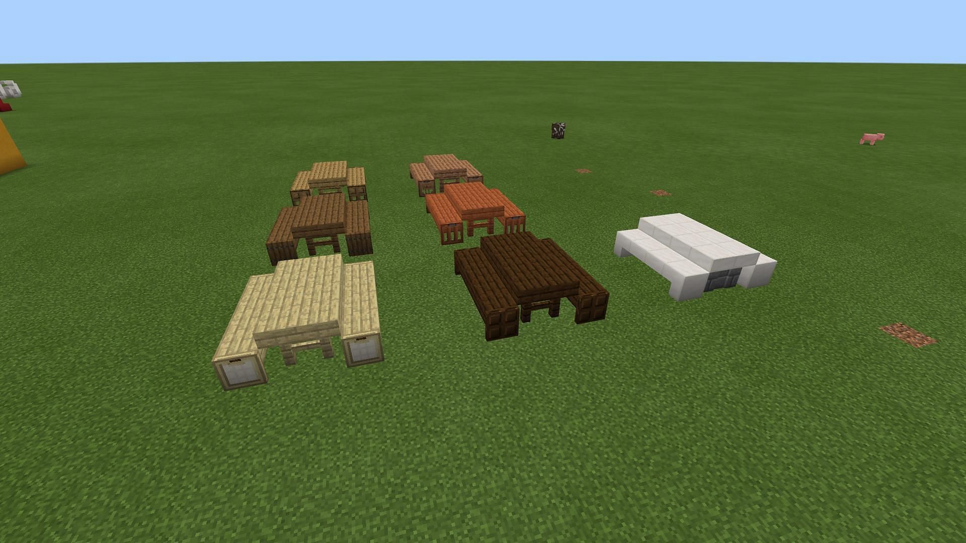 Picnic tables built of slabs, trapdoors, and fence blocks (Image via Mojang)