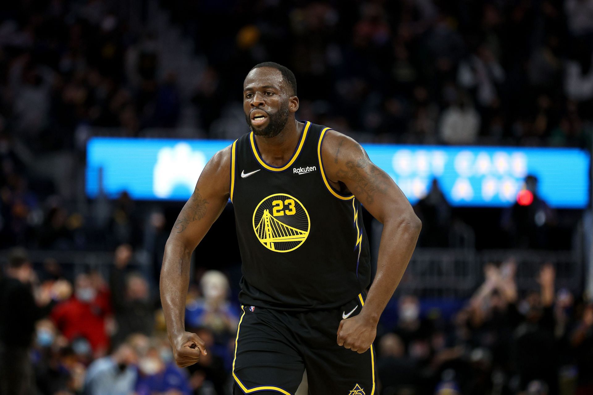 Draymond Green reacts after Jordan Poole of the Golden State Warriors dunked on Omer Yurtseven of the Miami Heat in the second half on Jan. 3, 2022 in San Francisco, California.