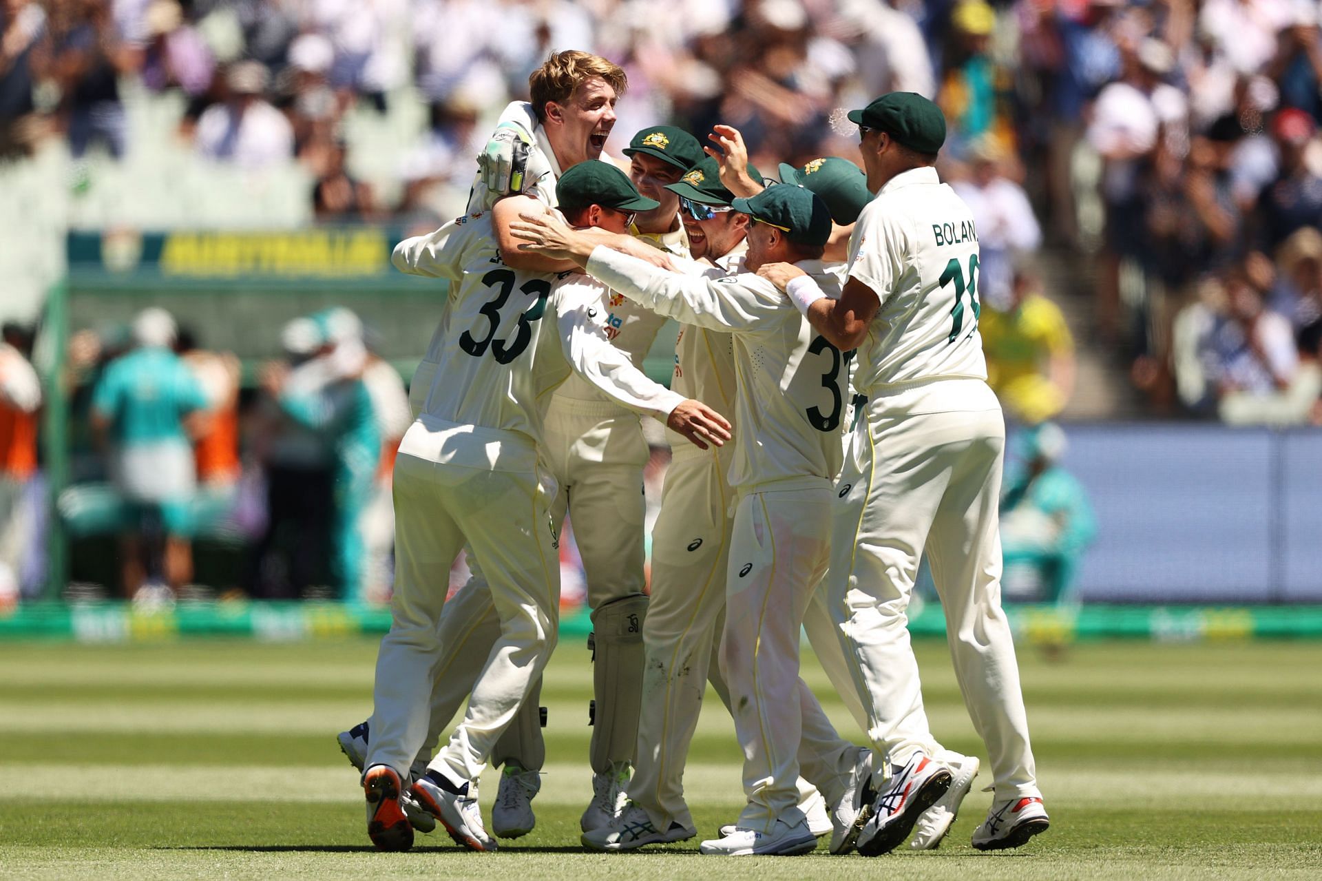 Australia celebrate after winning the Boxing Day Test at the MCG and thereby retaining the Ashes with an unassailable 3-0 lead.