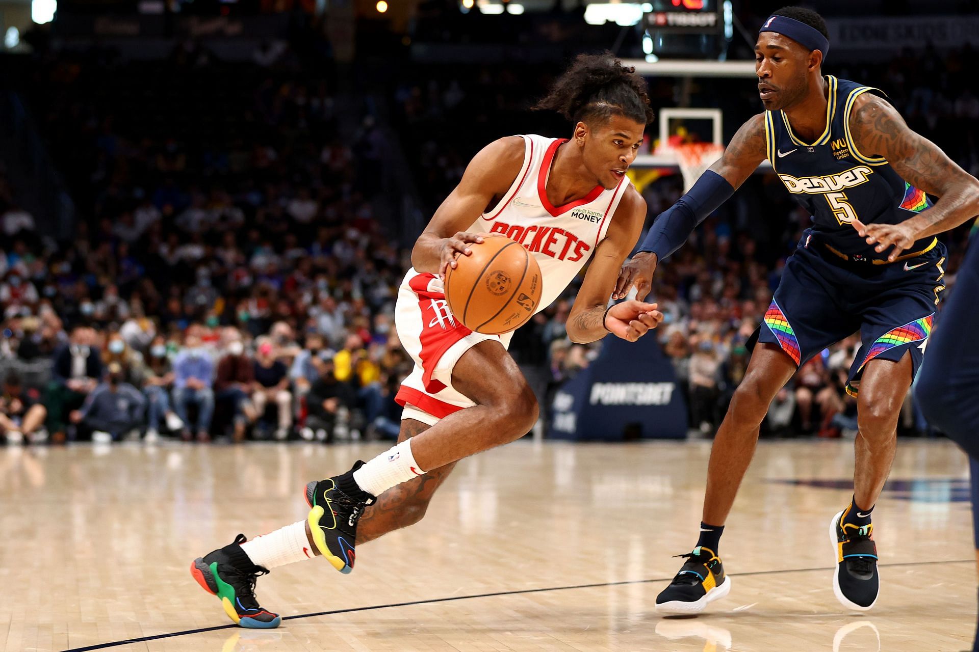 Jalen Green of the Houston Rockets against Will Barton of the Denver Nuggets