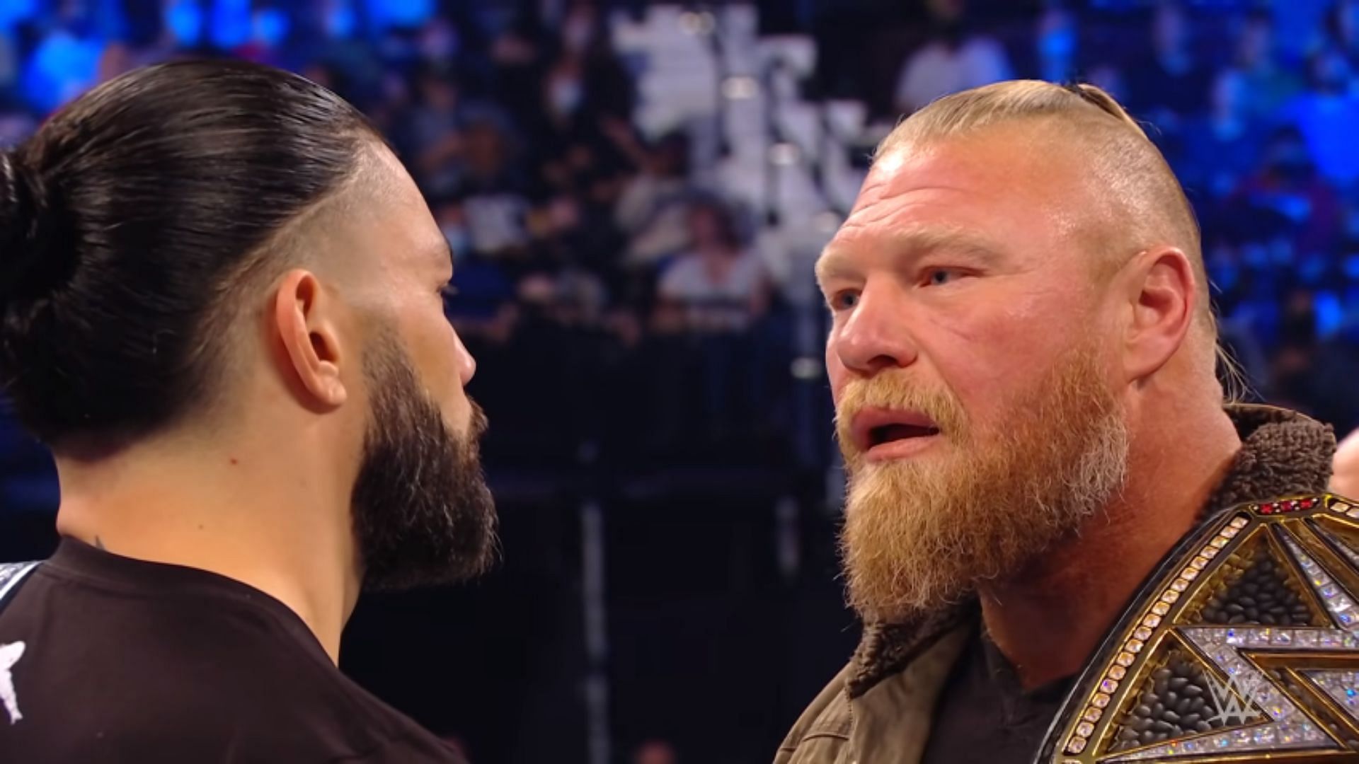 Universal Champion Roman Reigns (left); WWE Champion Brock Lesnar (right)