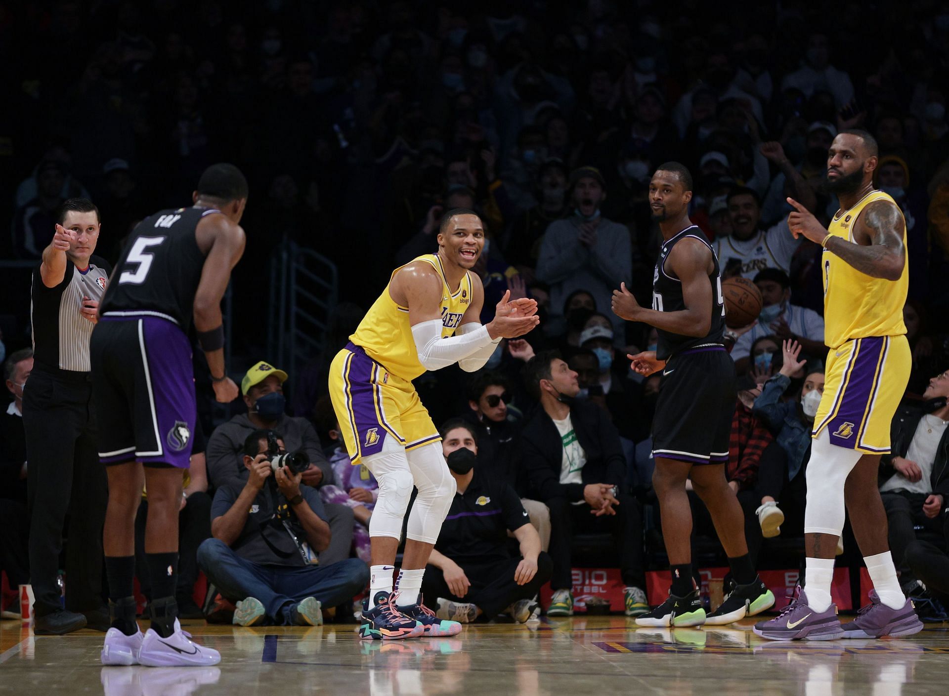 Russell Westbrook (L) of the LA Lakers reacts against the Sacramento Kings