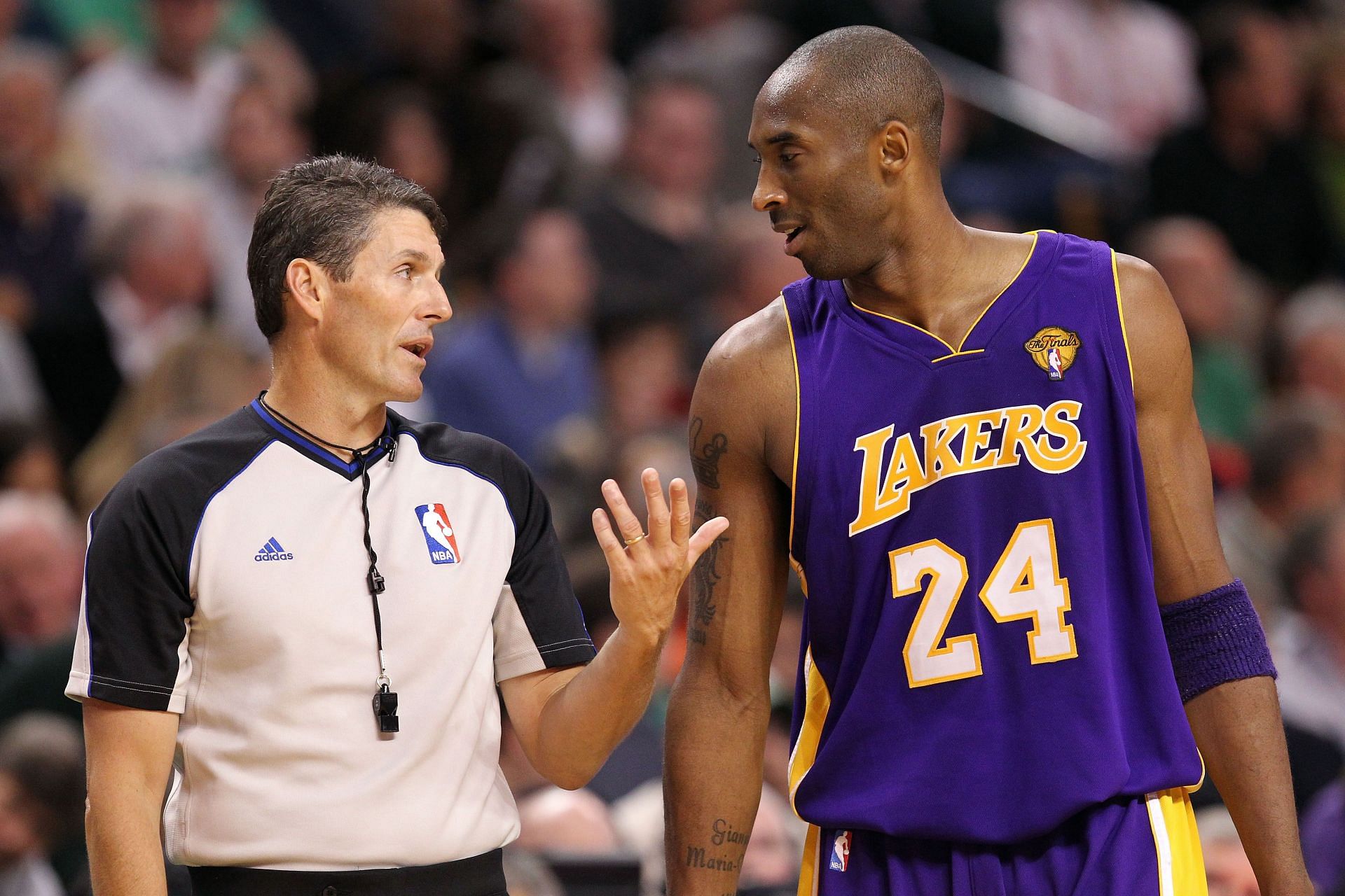 Referee Scott Foster talks to Kobe Bryant of the LA Lakers.