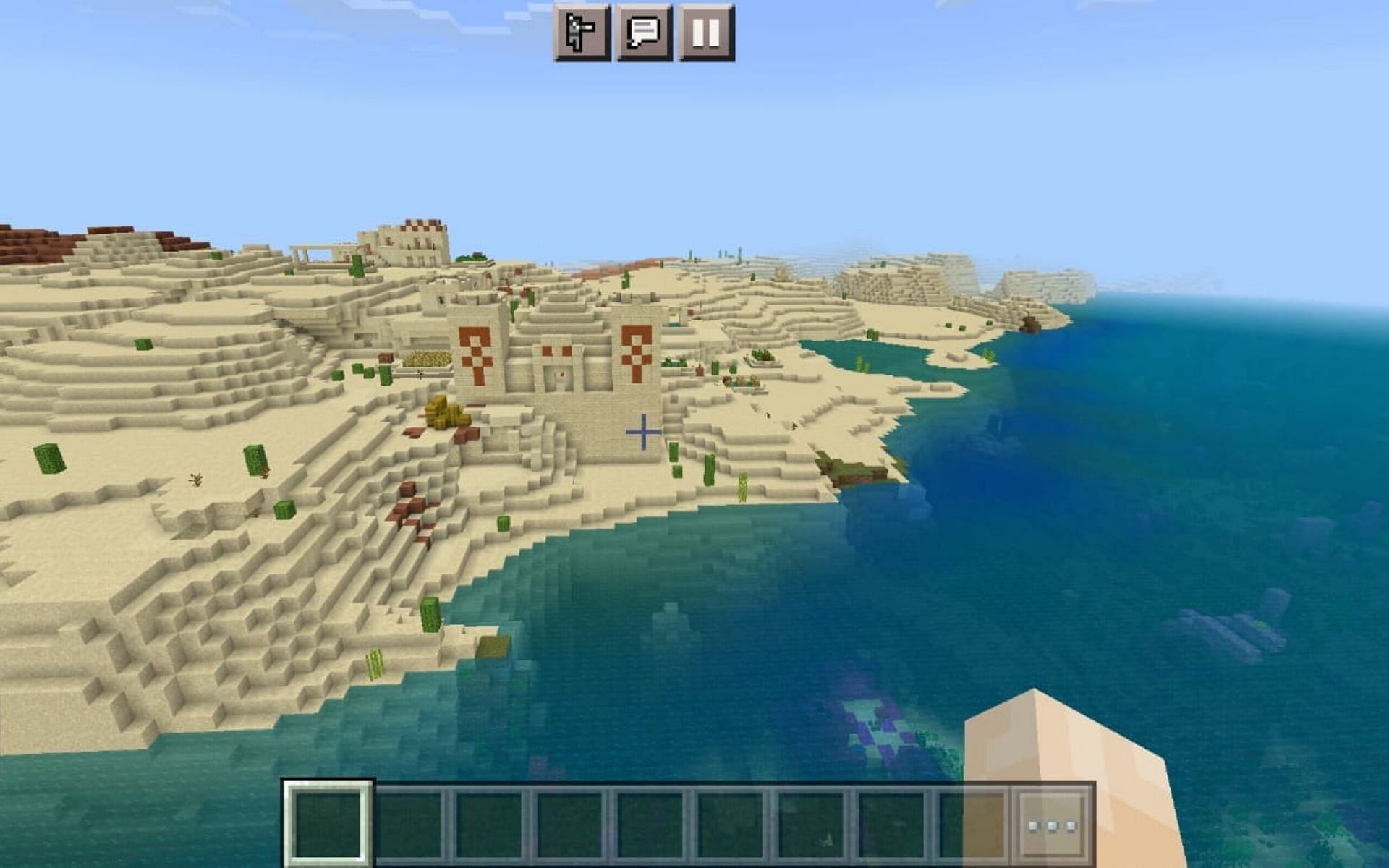 Spawning within a Desert Temple in a Village on a Shore with Coral Reefs (Image via Minecraft)