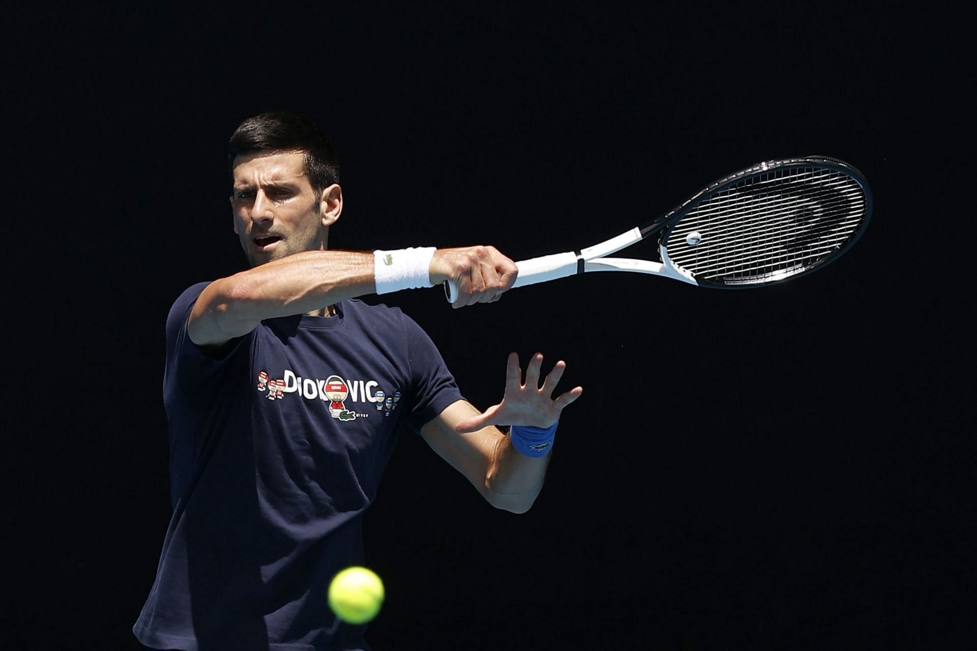 Novak Djokovic practices at the Rod Laver Arena in Melbourne