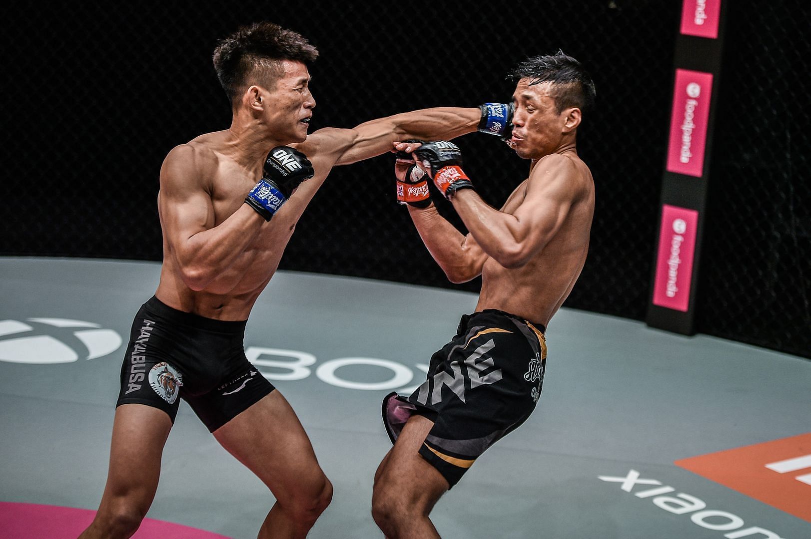 Tang Kai (left) wants a shot at the featherweight gold. [Photo: ONE Championship]