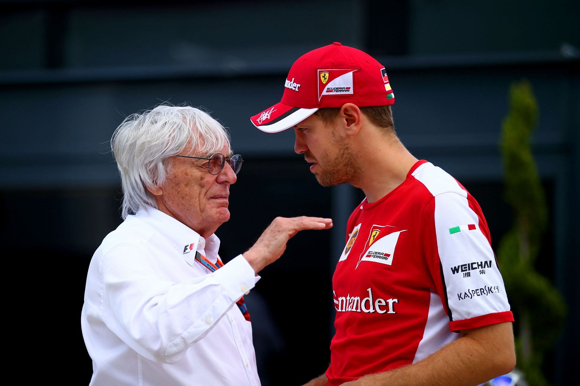 Bernie Ecclestone (left) and Sebastian Vettel (right) ahead of the 2017 British Grand Prix