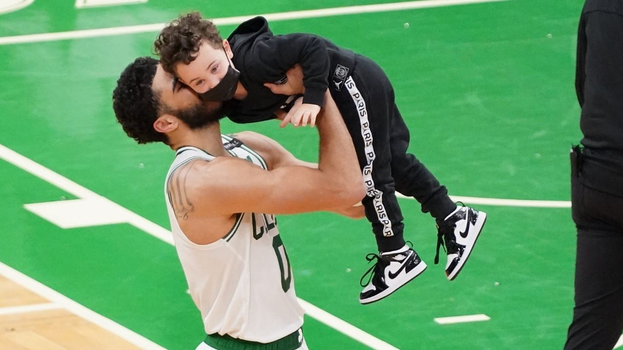 Jayson Tatum of the Boston Celtics with his son, Deuce Tatum