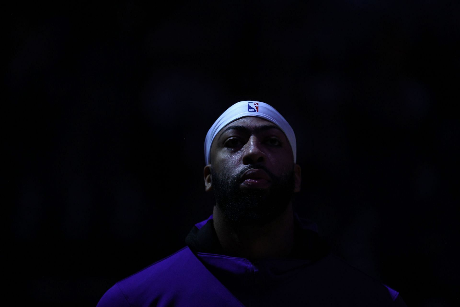 Anthony Davis of the LA Lakers stands for the national anthem before playing the Sacramento Kings on Nov. 30 in Sacramento, California.