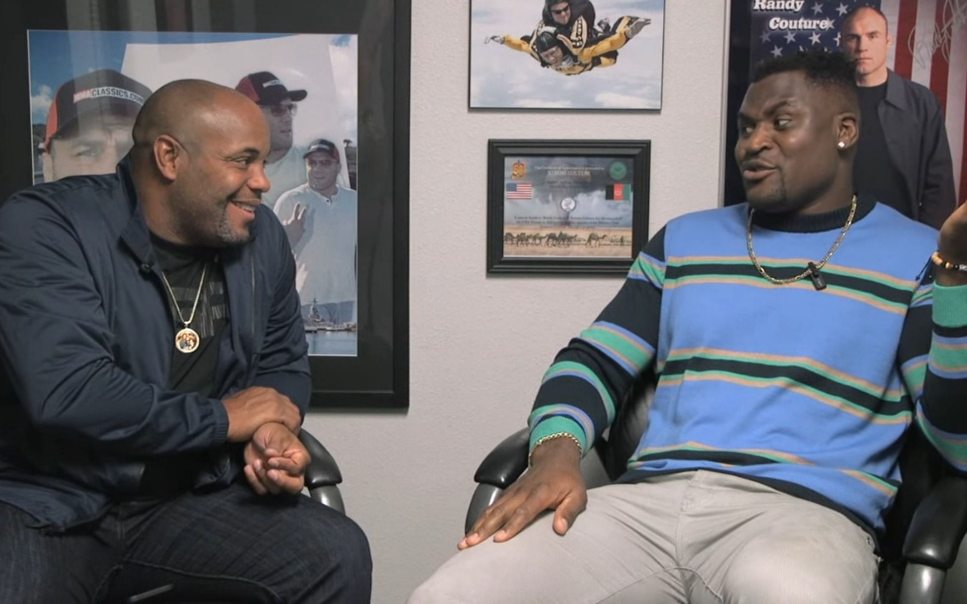 Former and current UFC heavyweight champions Daniel Cormier (left) and Francis Ngannou (right), respectively [Image Credit: screen grab from DC&#039;s official YouTube channel]