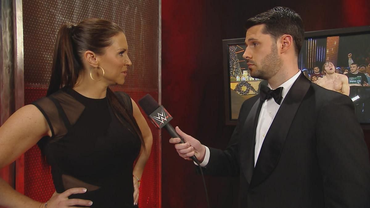 Former WWE commentator Tom Phillips interviewing Stephanie McMahon