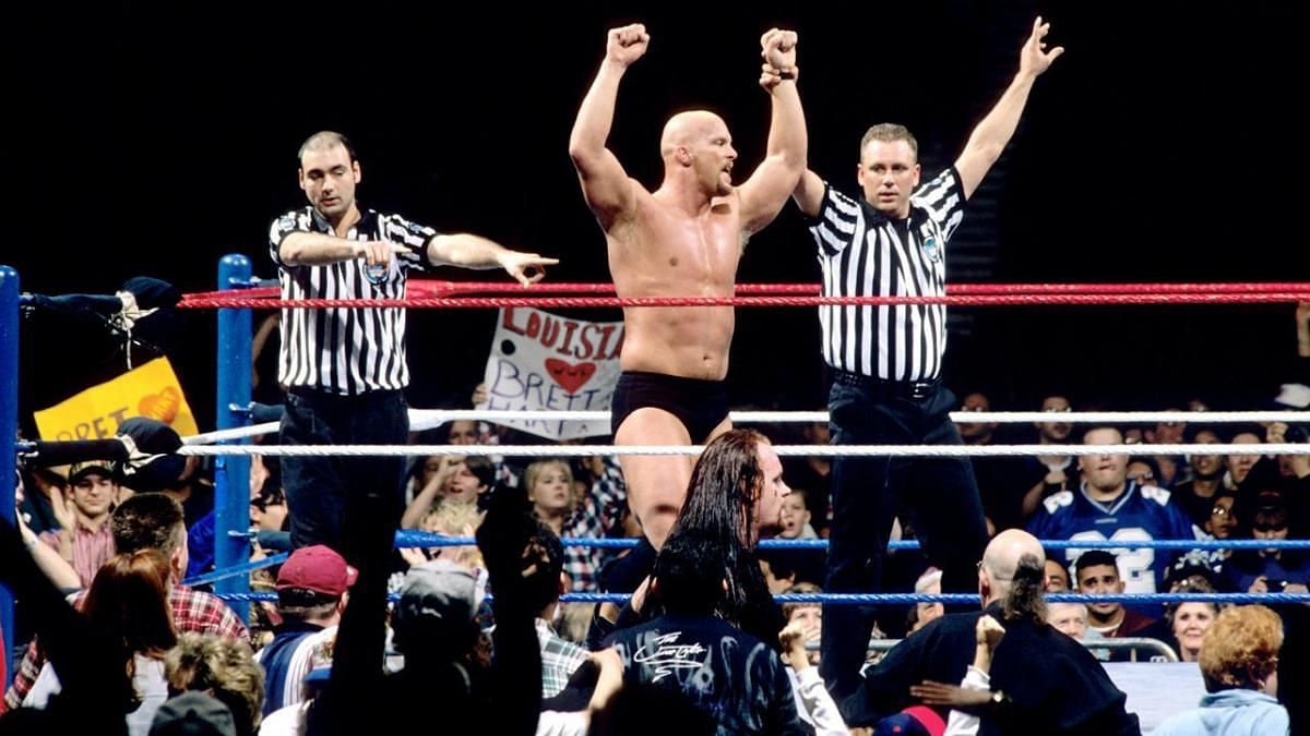 Stone Cold Steve Austin celebrates winning the 1997 Rumble
