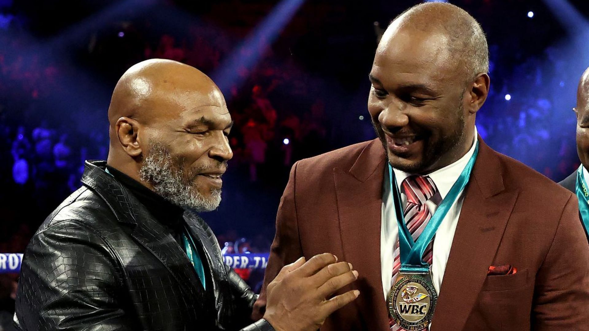 Lennox Lewis (R) and Mike Tyson [Image Courtesy: @badlefthook on Twitter]