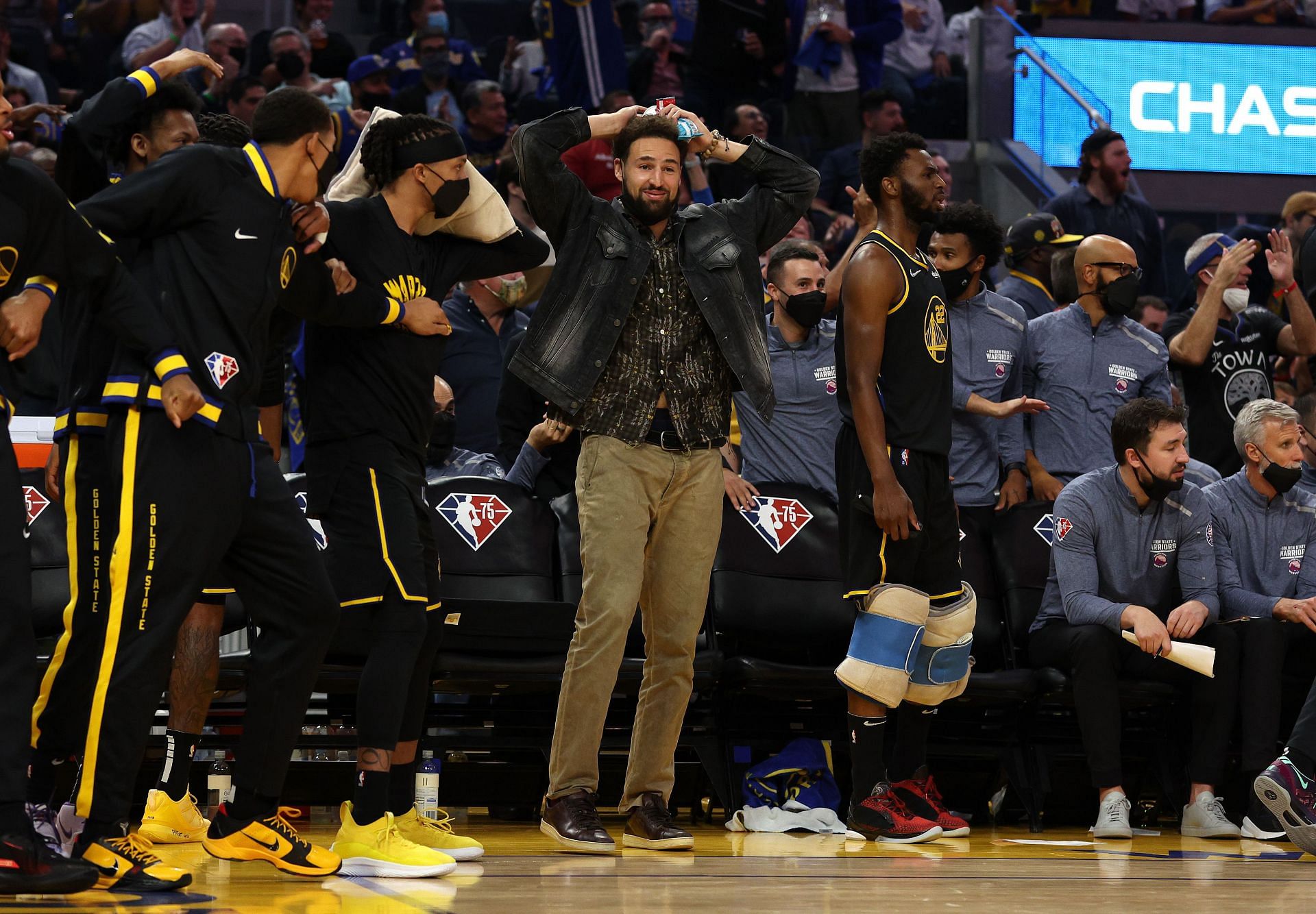 Thompson cheering on the Golden State Warriors from the sidelines