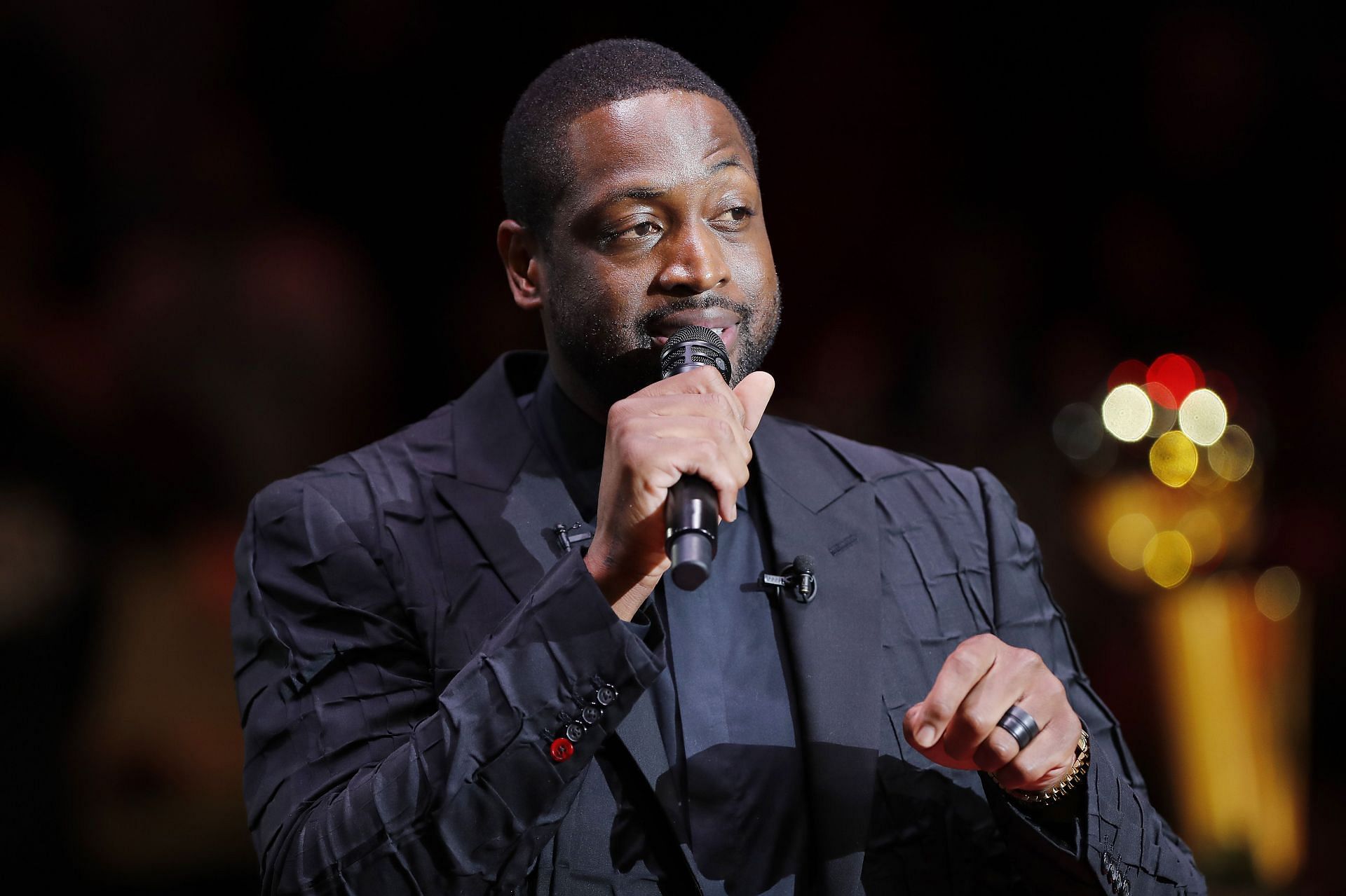 Former Miami Heat player Dwyane Wade addresses the crowd during his jersey retirement ceremony at American Airlines Arena on February 22, 2020 in Miami, Florida.