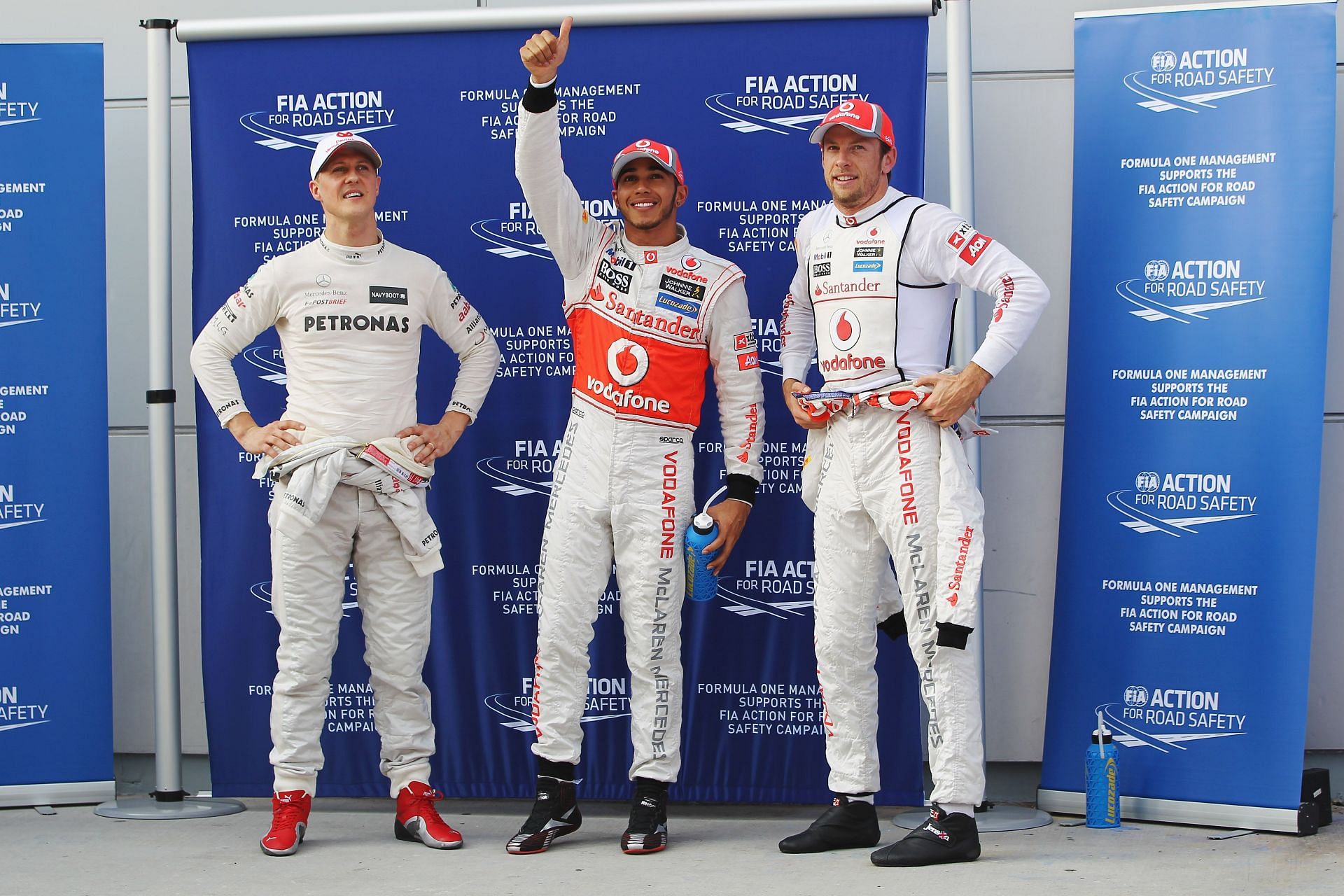 F1 Grand Prix of Malaysia 2010 - Lewis Hamilton with Michael Schumacher (left) and Jenson Button (right)