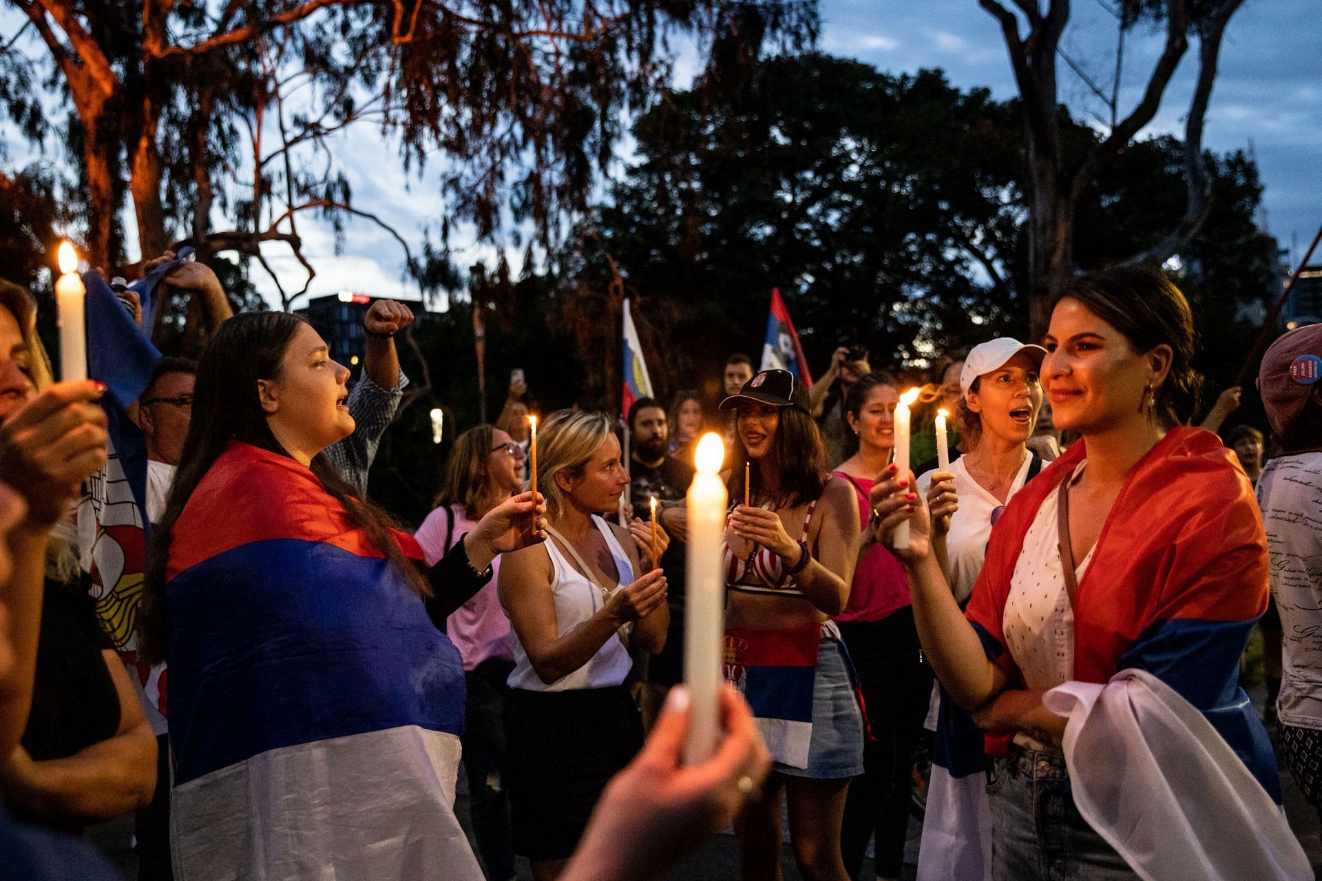 Fans of Novak Djokovic hold a vigil for their player