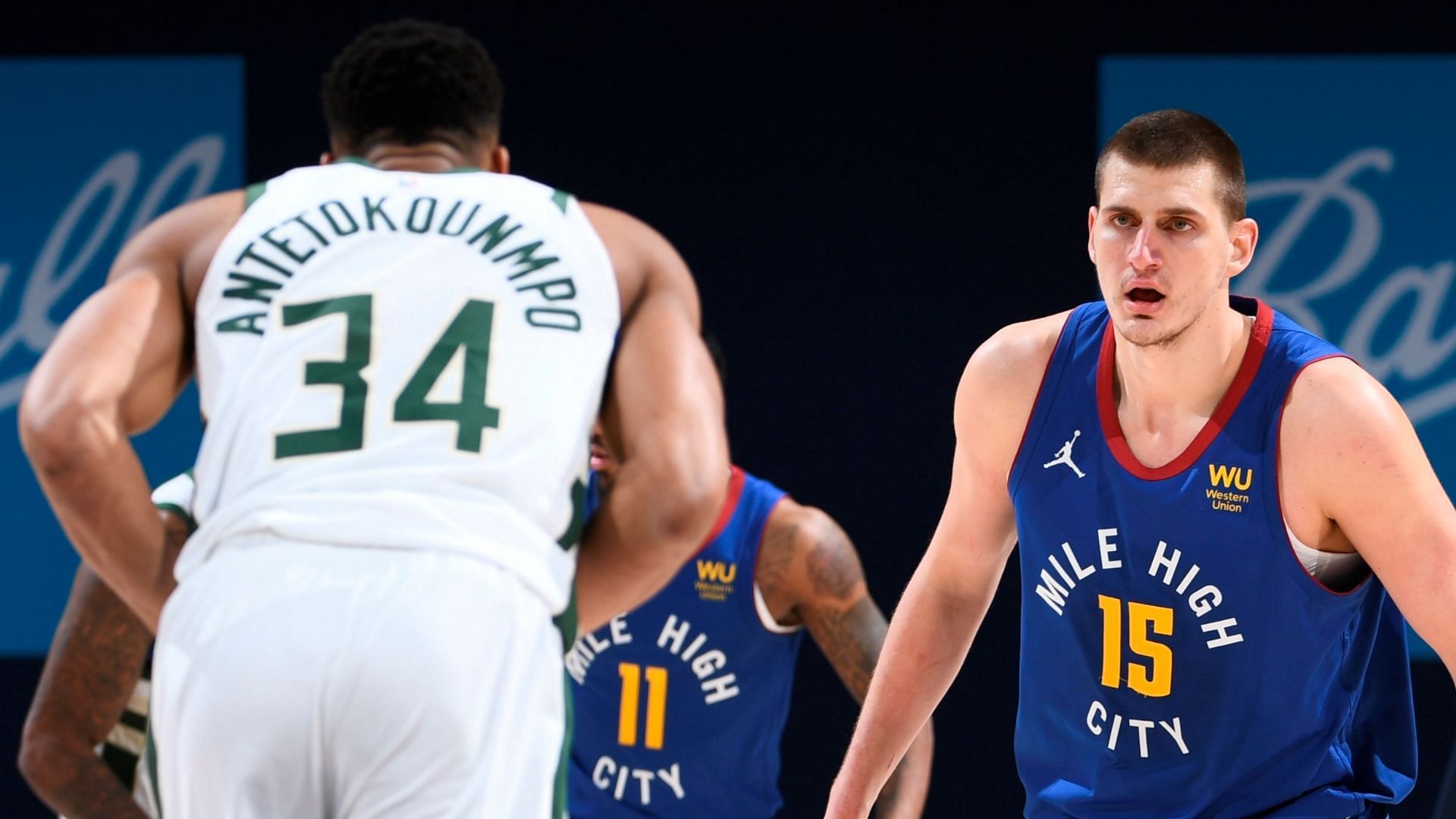 Giannis Antetokounmpo of the Milwaukee Bucks against Nikola Jokic of the Denver Nuggets