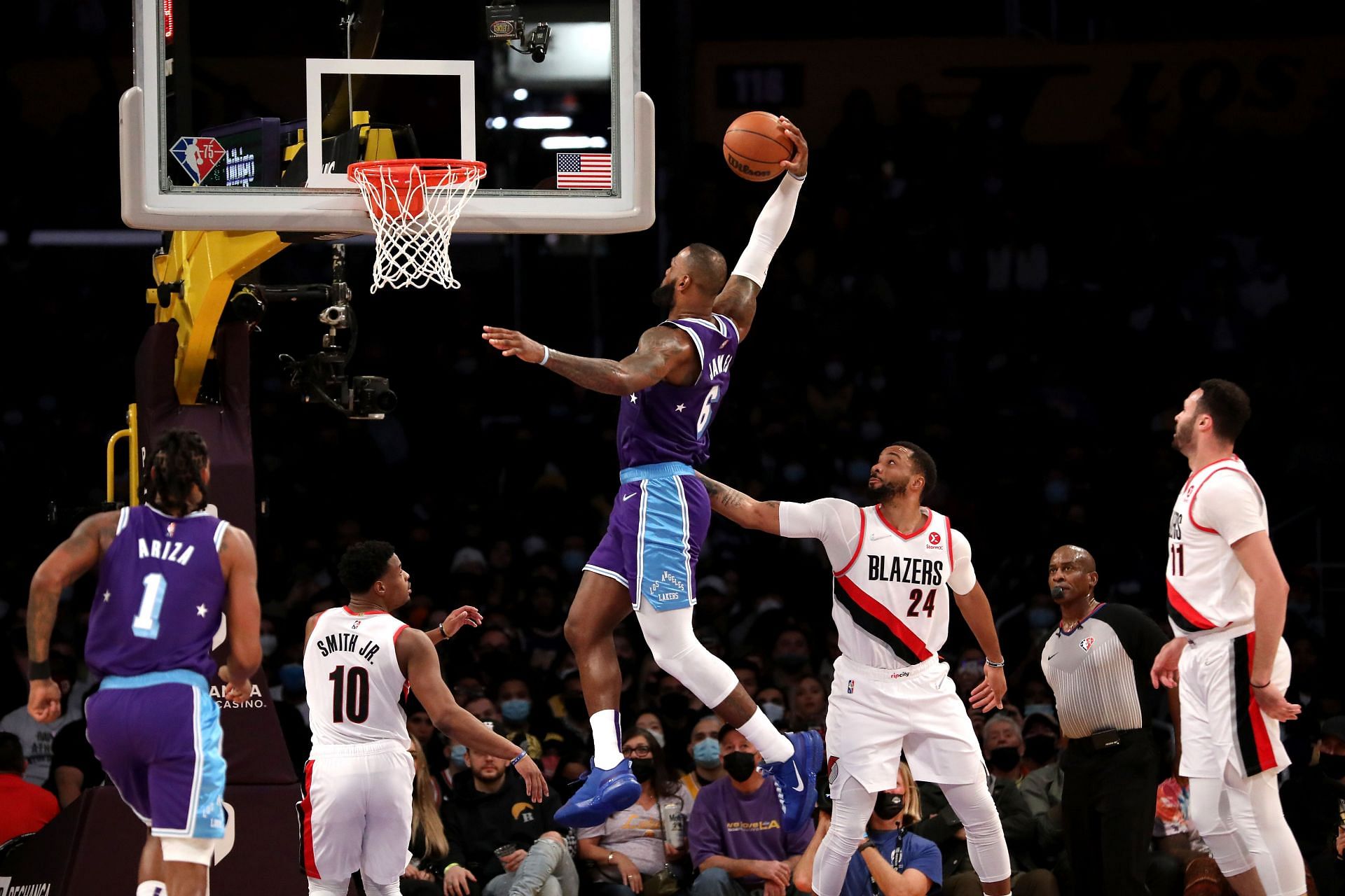 LeBron James of the Los Angeles Lakers dunking against the Portland Trail Blazers.