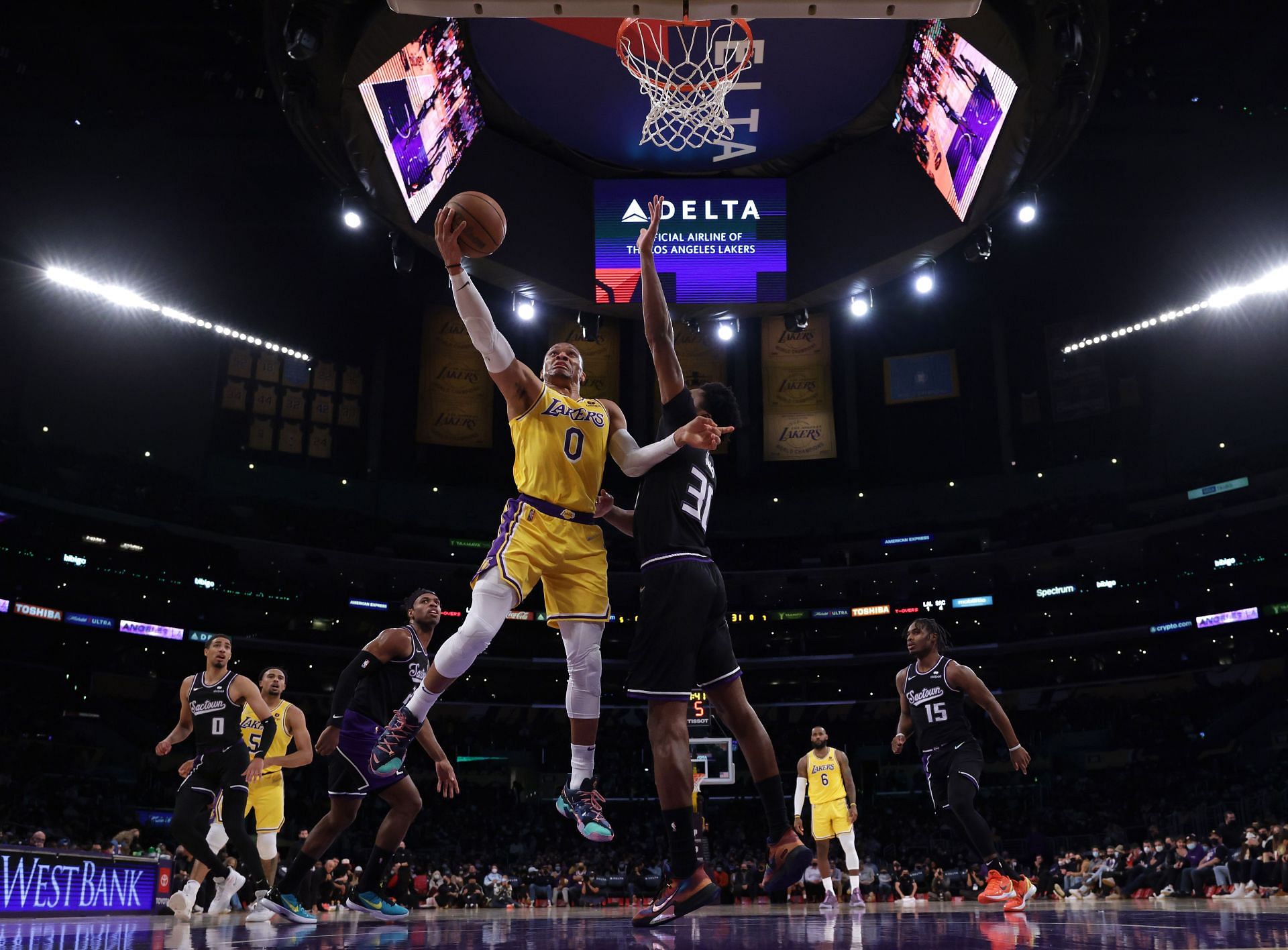 Russell Westbrook attempts a layup against the Sacramento Kings