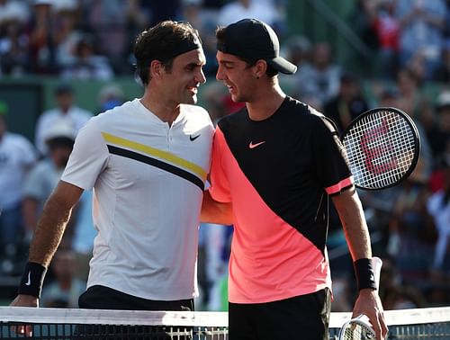 Roger Federer congratulates Thanasi Kokkinakis after their match at the 2018 Miami Open